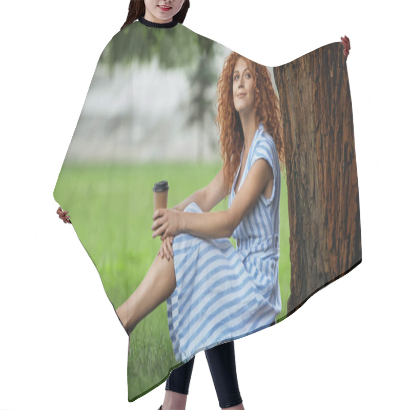 Personality  Pleased Redhead Woman In Blue Dress Sitting Under Tree Trunk And Holding Coffee To Go  Hair Cutting Cape