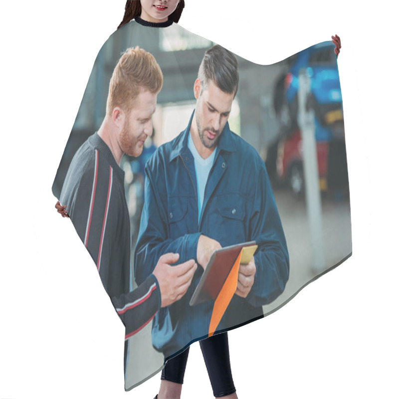 Personality  Automechanic And Client Looking Digital Tablet Hair Cutting Cape