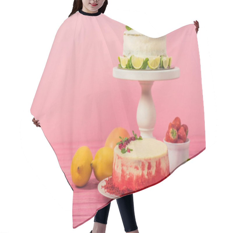 Personality  Cake Decorated With Currants And Mint Leaves Near Fruits And White Cake With Lemon Slices On Pink Wooden Surface Isolated On Pink Hair Cutting Cape