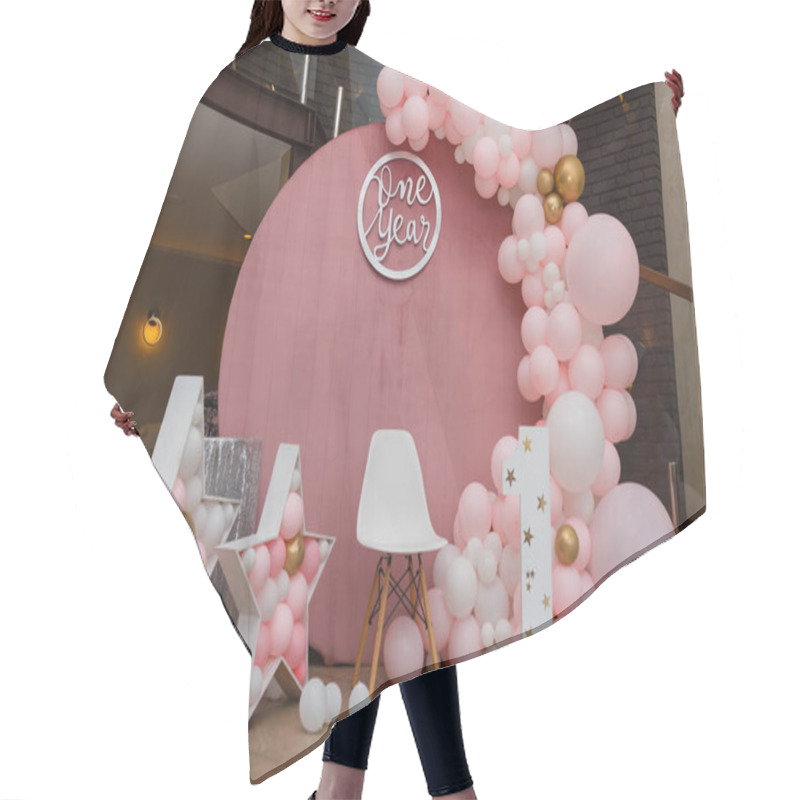 Personality  Izmail, Ukraine - May 2020. Beautiful Decorations, Pink And Golden Balloons Arch, Wooden Stars, White Chair And Number One On Wooden Round Background. Little 1 Year Old Girl Birthday Party Photo Zone Hair Cutting Cape