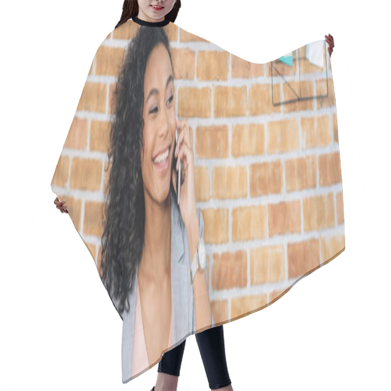 Personality  Panoramic Shot Of Smiling African American Casual Businesswoman Talking On Smartphone Hair Cutting Cape