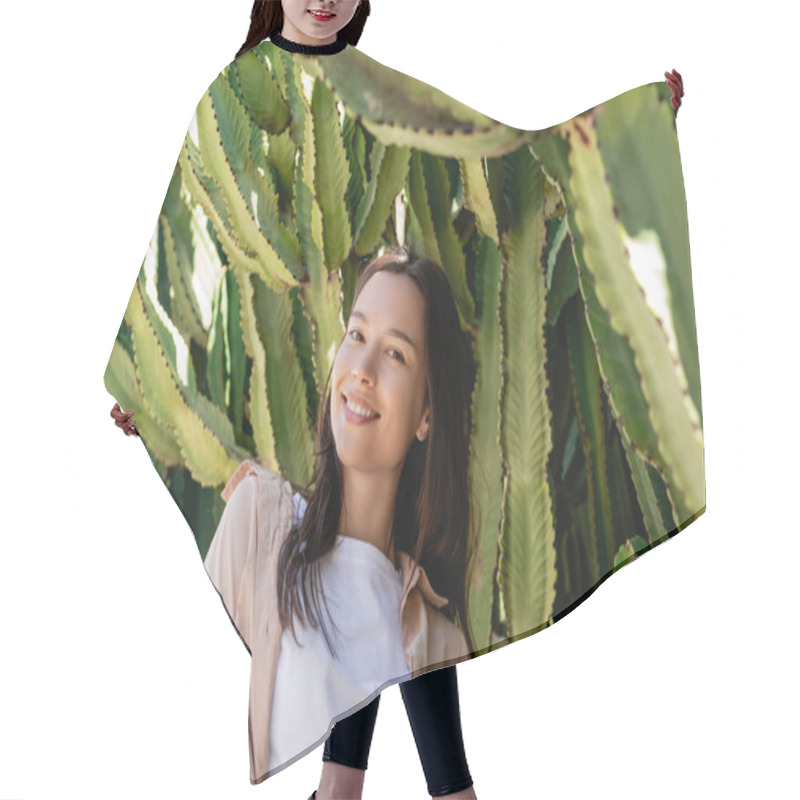 Personality  Cheerful Brunette Woman Looking At Camera Near Green Succulents Hair Cutting Cape