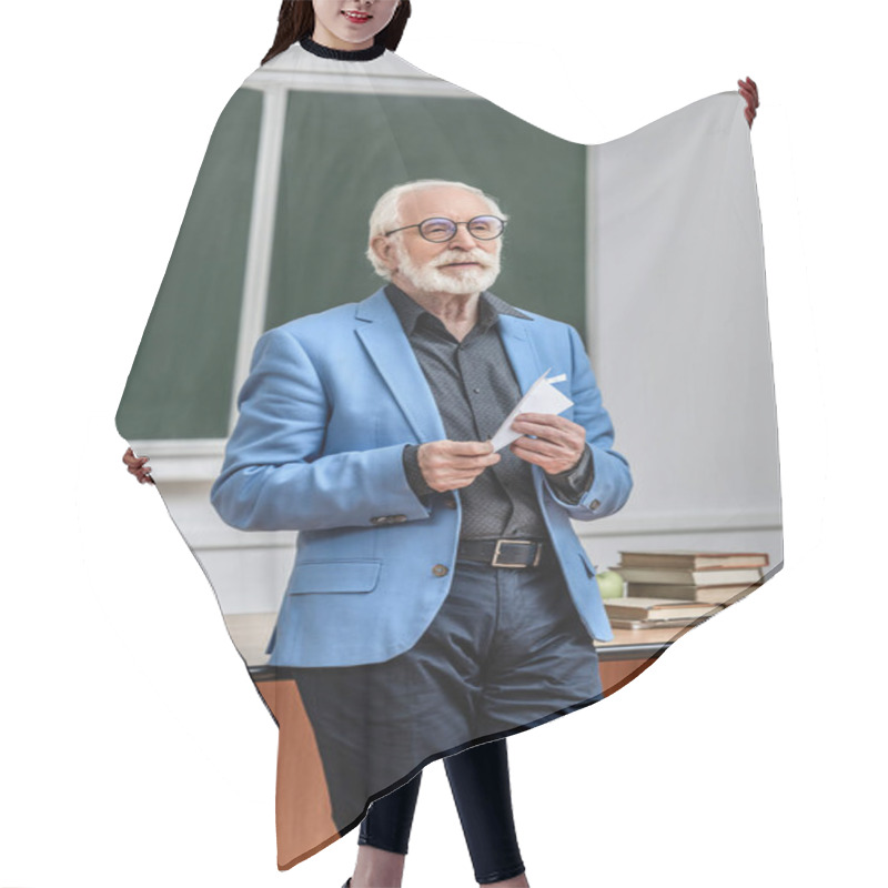 Personality  Grey Hair Professor Holding Paper Plane In Lecture Hall Hair Cutting Cape