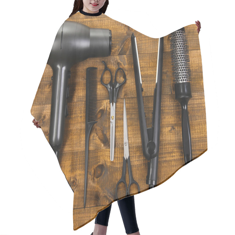 Personality  Hairdressing Tools On Wooden Table Close-up Hair Cutting Cape