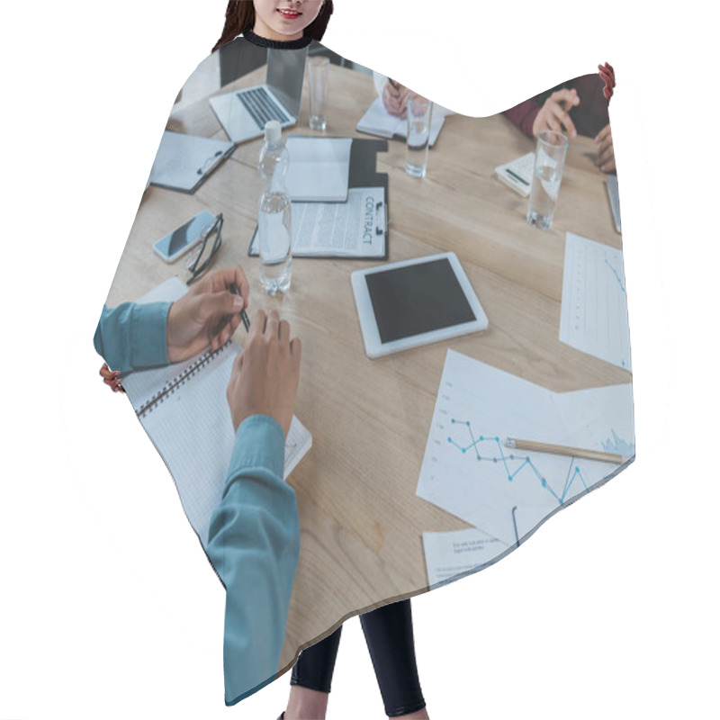 Personality  Cropped View Of Businesspeople Sitting At Desk Near Digital Devices, Notebooks And Documents In Meeting Room Hair Cutting Cape