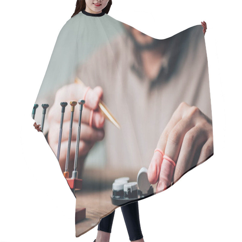 Personality  Cropped View Of Watchmaker Holding Tweezers By Tool Tray And Screwdrivers On Table Hair Cutting Cape