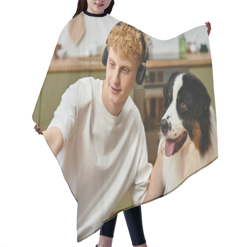 Personality  A Young Man With Red Hair Is Taking Selfies With His Australian Shepherd In Their Modern Apartment. Hair Cutting Cape