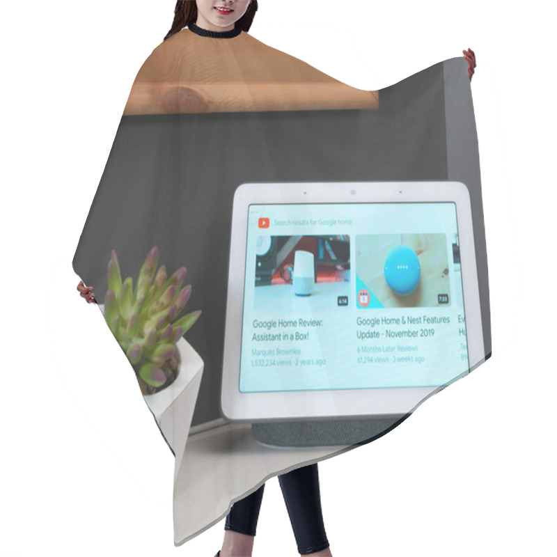 Personality  Nov 2019, UK - Google Nest Hub In Living Room Den Showing Youtube Videos Hair Cutting Cape