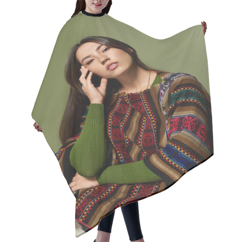 Personality  A Beautiful Young Woman Poses Confidently While Wearing A Vibrant Poncho, Embracing Her Style. Hair Cutting Cape