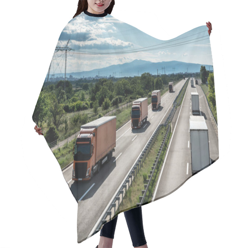 Personality  Highway Transportation With A Convoy Of Lorry Trucks Passing Cars And Vans With A Beautiful Sunset Sky Hair Cutting Cape