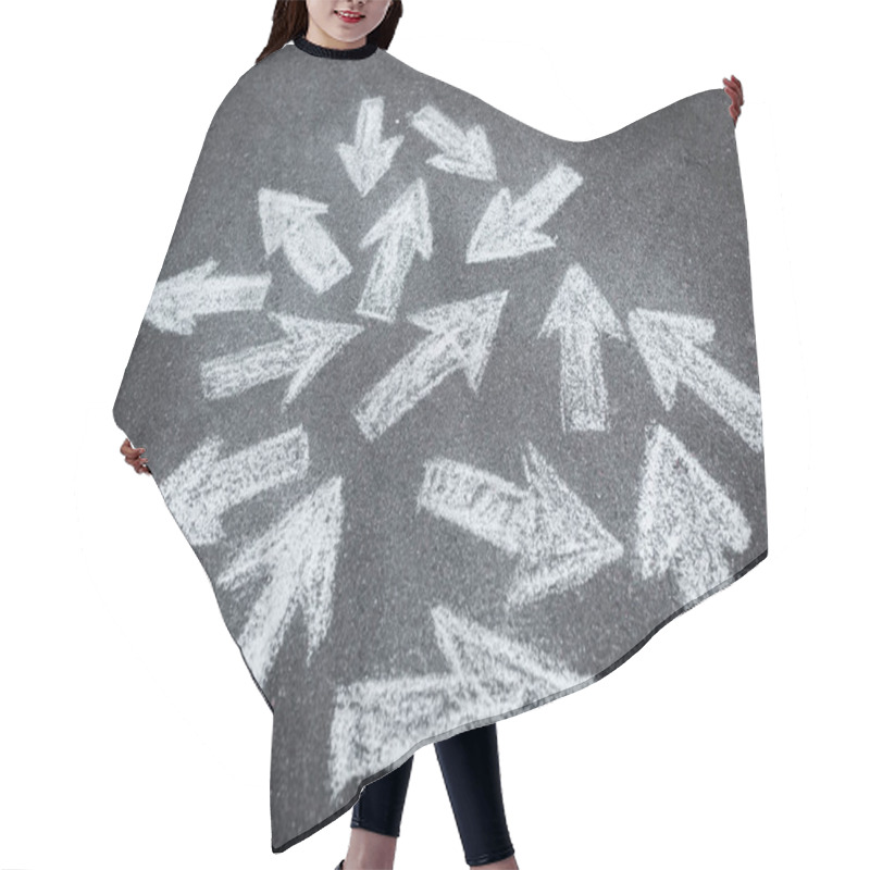 Personality  Cropped View Of Woman Standing Near Directional Arrows On Asphalt  Hair Cutting Cape