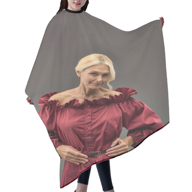 Personality  A Mature, Elegant Woman In A Chic Red Dress Striking A Pose. Hair Cutting Cape