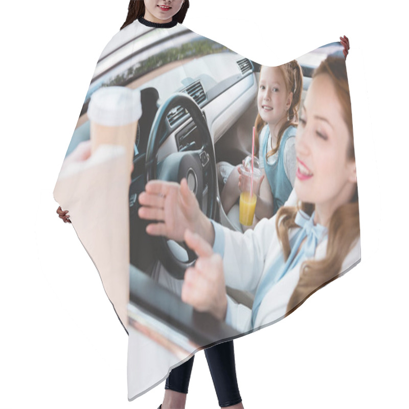 Personality  Selective Focus Of Smiling Businesswoman Taking Take Away Order With Daughter On Passengers Seat In Car Hair Cutting Cape