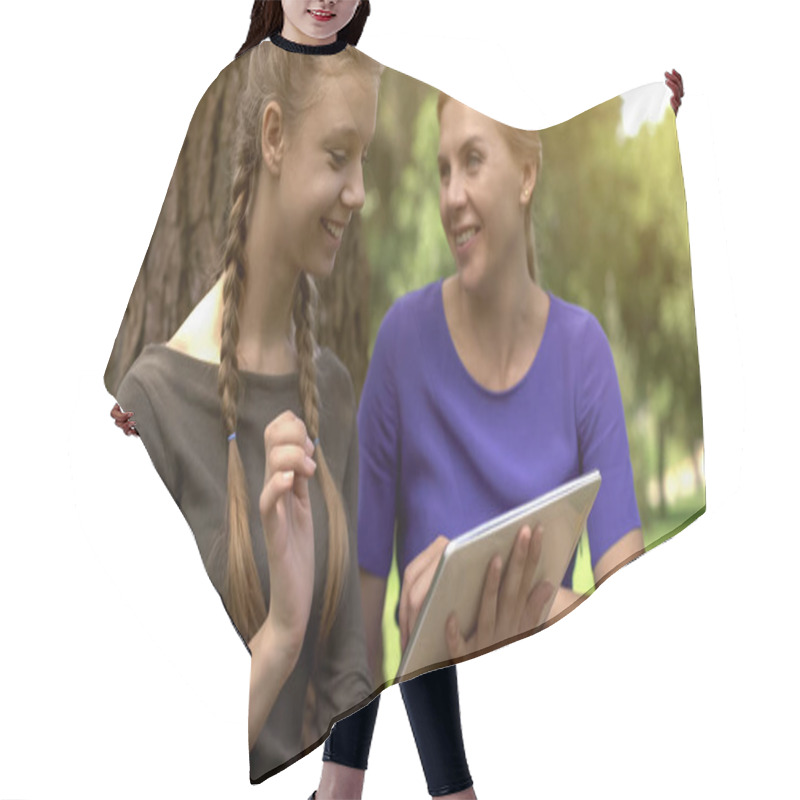 Personality  Happy Daughter And Mother Shopping Online In Park, Using Tablet, Sales In Stores Hair Cutting Cape