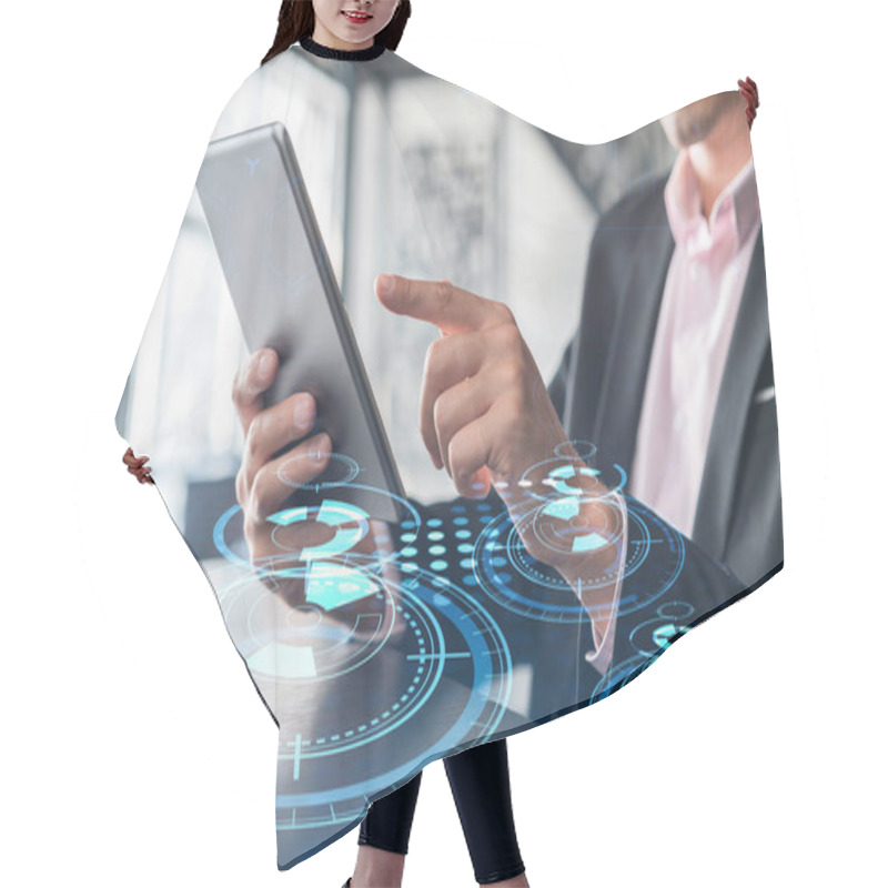 Personality  Businessman In Suit Using Tablet Device To Optimize Development By Implying New Technologies In Business Process. Interconnections And Hi Tech Hologram Over Modern Panoramic Office Background Hair Cutting Cape