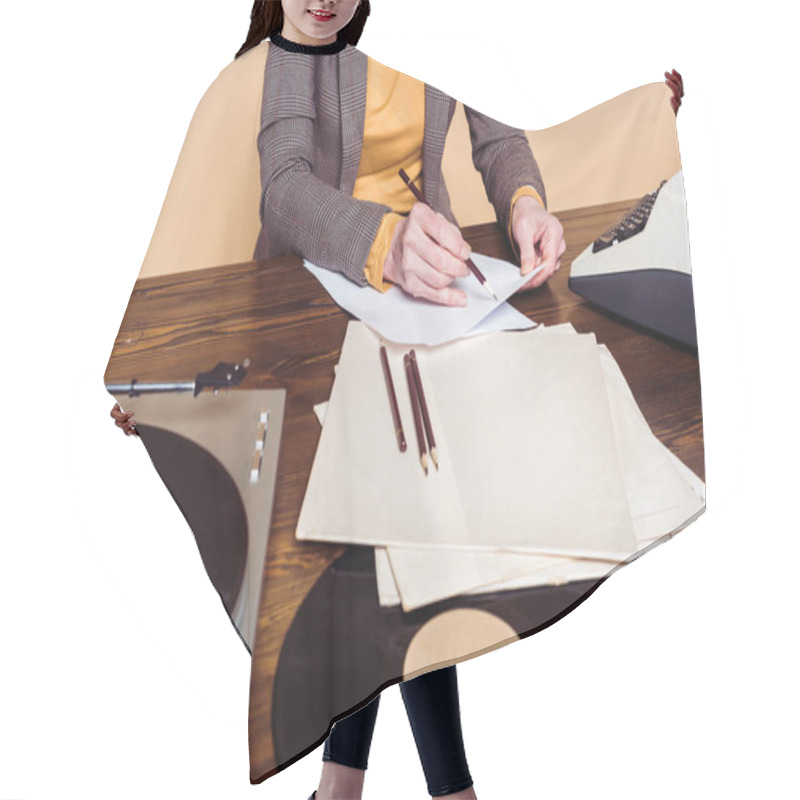 Personality  Cropped Image Of Woman Writing In Paper At Table With Vinyl Disc, Record Player And Typewriter  Hair Cutting Cape