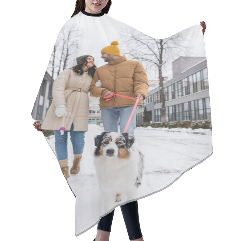 Personality  Full Length Of Blurred And Happy Couple In Winter Jackets And Hats Strolling With Australian Shepherd Dog Hair Cutting Cape