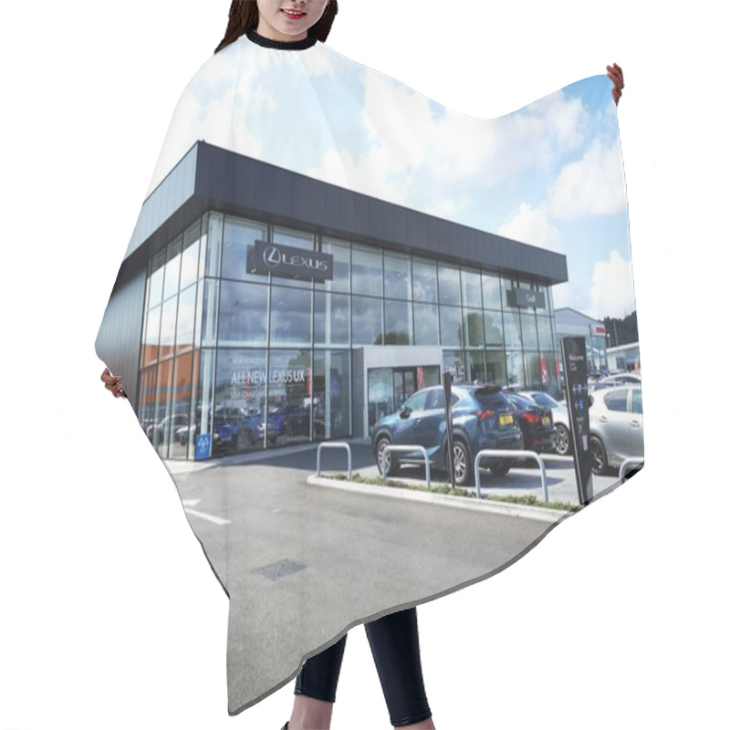 Personality  Cardiff, UK: August 19, 2019: Lexus Car Dealership. Lexus Is The Luxury Vehicle Division Of The Japanese Automaker Toyota. Lexus Specialise In Alternative Fuel Hybrid Vehicles. Hair Cutting Cape