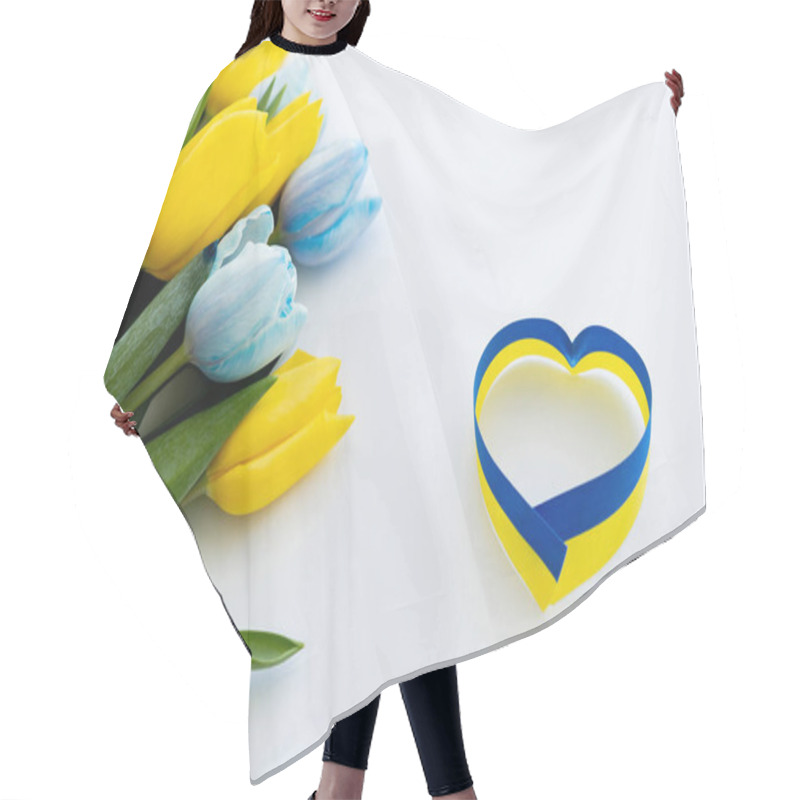 Personality  Blue And Yellow Ribbon In Heart Shape Near Flowers On White Background  Hair Cutting Cape