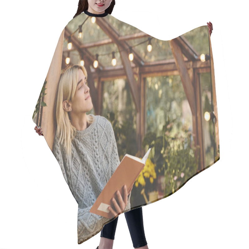 Personality  In A Cozy Greenhouse Adorned With Warm String Lights, A Handsome Young Man Reads Thoughtfully, Immersed In A Book. Vibrant Flowers And Lush Greenery Create A Serene Atmosphere. Hair Cutting Cape