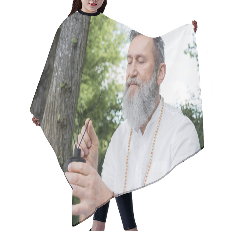 Personality  Senior Guru Man With Grey Beard Holding Diffuser With Aroma Sticks Outdoors Hair Cutting Cape