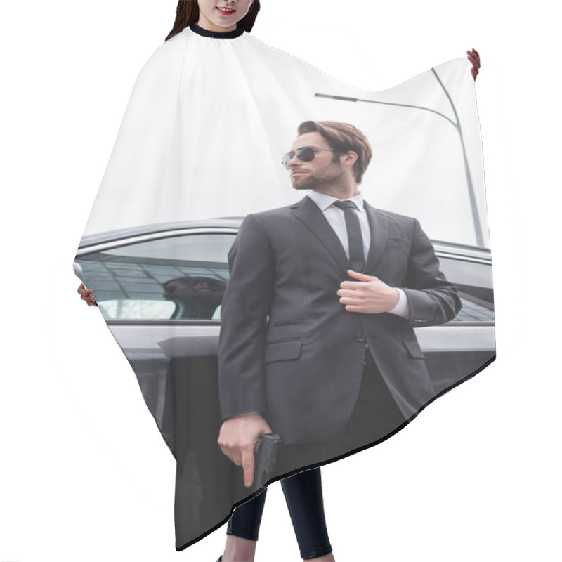 Personality  Low Angle View Of Bearded Safeguard In Sunglasses And Suit Standing Near Modern Car Hair Cutting Cape