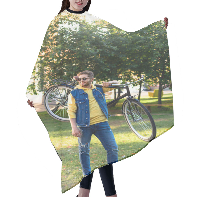 Personality  Young Cheerful Man In Sunglasses With Retro Bicycle In Park Hair Cutting Cape