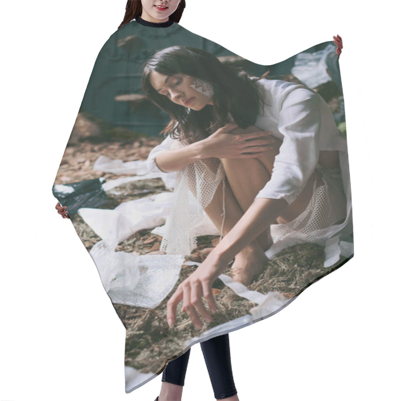 Personality  A Woman In A White Dress Poses Amidst Plastic Garbage In A Swampy Area. Hair Cutting Cape