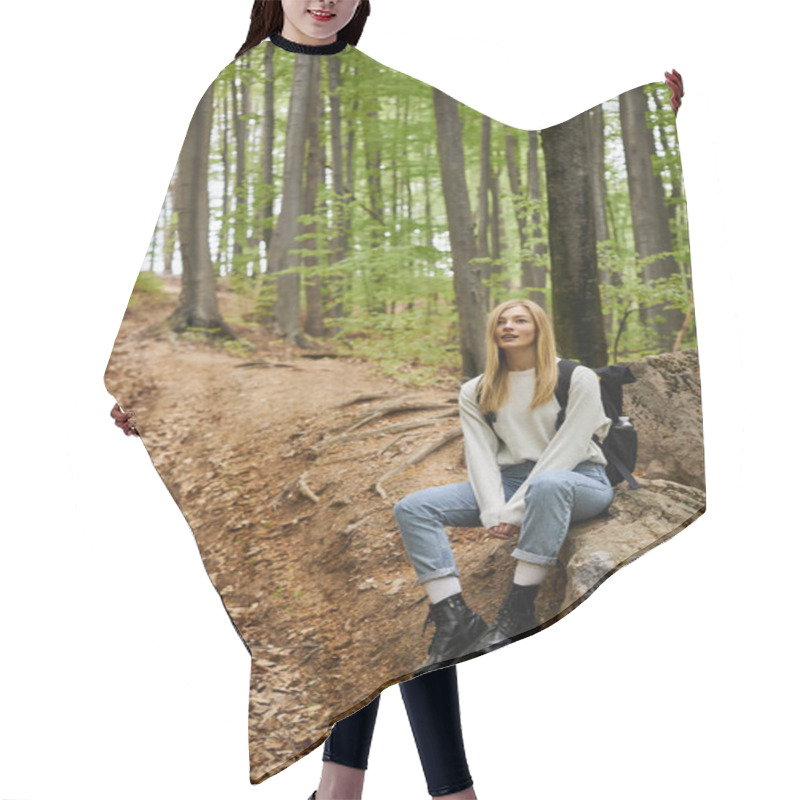 Personality  Smiling Blonde Female Hiker Wearing Backpack And Resting On Rocks While Sitting In Deep Woods Hair Cutting Cape