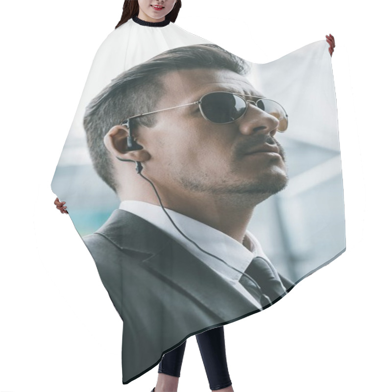 Personality  Portrait Of Handsome Security Guard In Sunglasses And Security Earpiece Hair Cutting Cape