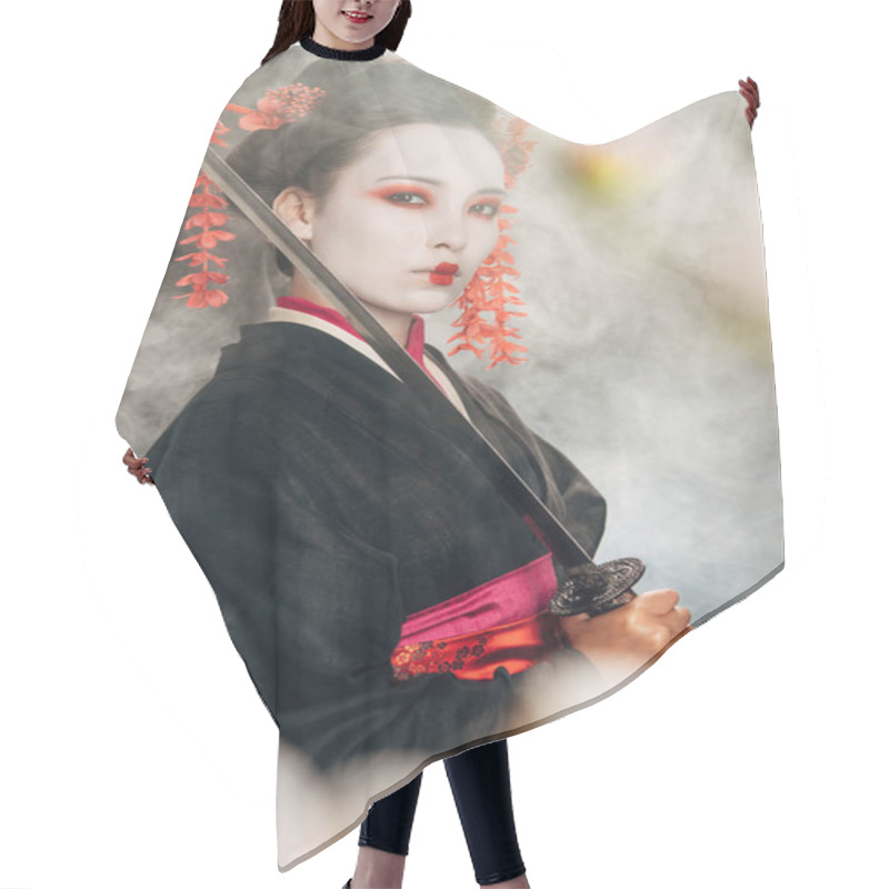 Personality  Selective Focus Of Serious Geisha In Black Kimono Holding Katana In Smoke And Sakura Branches Hair Cutting Cape