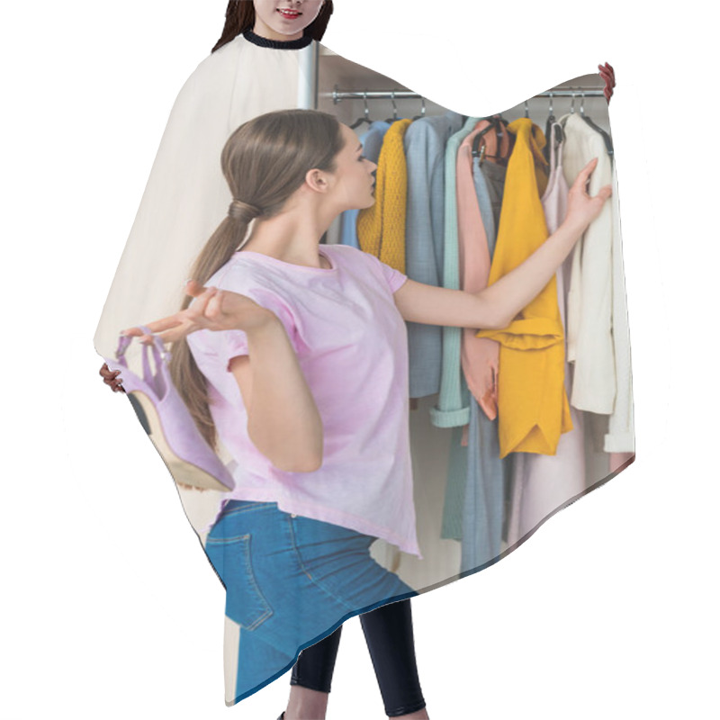 Personality  Attractive Young Woman Holding Shoes And Choosing Clothes From Cabinet At Home Hair Cutting Cape