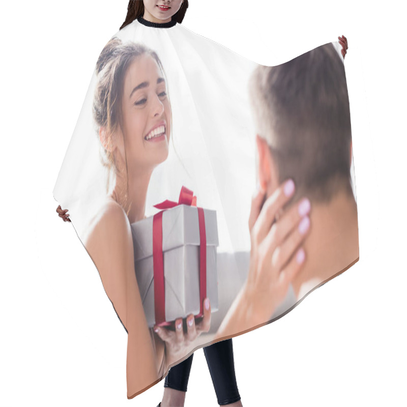 Personality  Happy Sensual Woman Holding Gift Box And Touching Man On Blurred Foreground Hair Cutting Cape