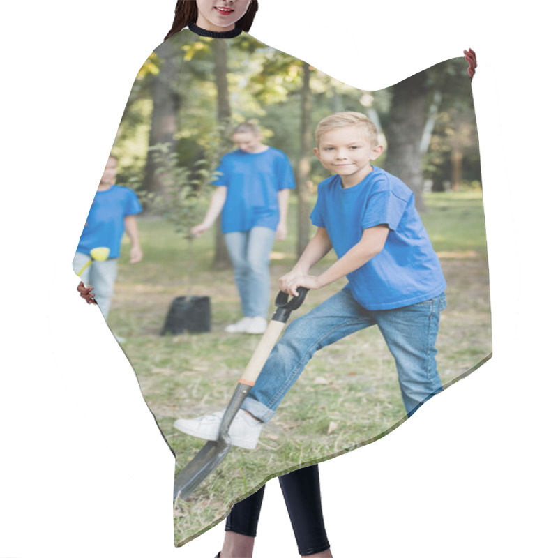 Personality  Boy Digging Ground With Shovel Near Mother And Sister With Watering Can And Young Seedling On Blurred Background, Ecology Concept Hair Cutting Cape