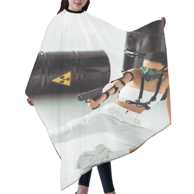 Personality  Futuristic African American Woman In Safety Mask Aiming Gun Near Radioactive Waste Barrels On White Background Hair Cutting Cape