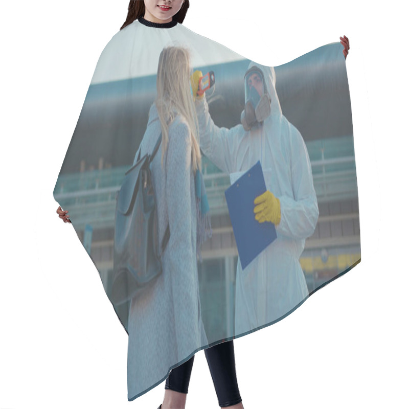 Personality  Shot Of Medical Worker In Protective Suit Screening Passenger To Check Woman Have Temperature Covid-19 Symptoms Coronavirus Checkpoints Airports Mask Infection Epidemic Corona Passengers Slow Motion Hair Cutting Cape