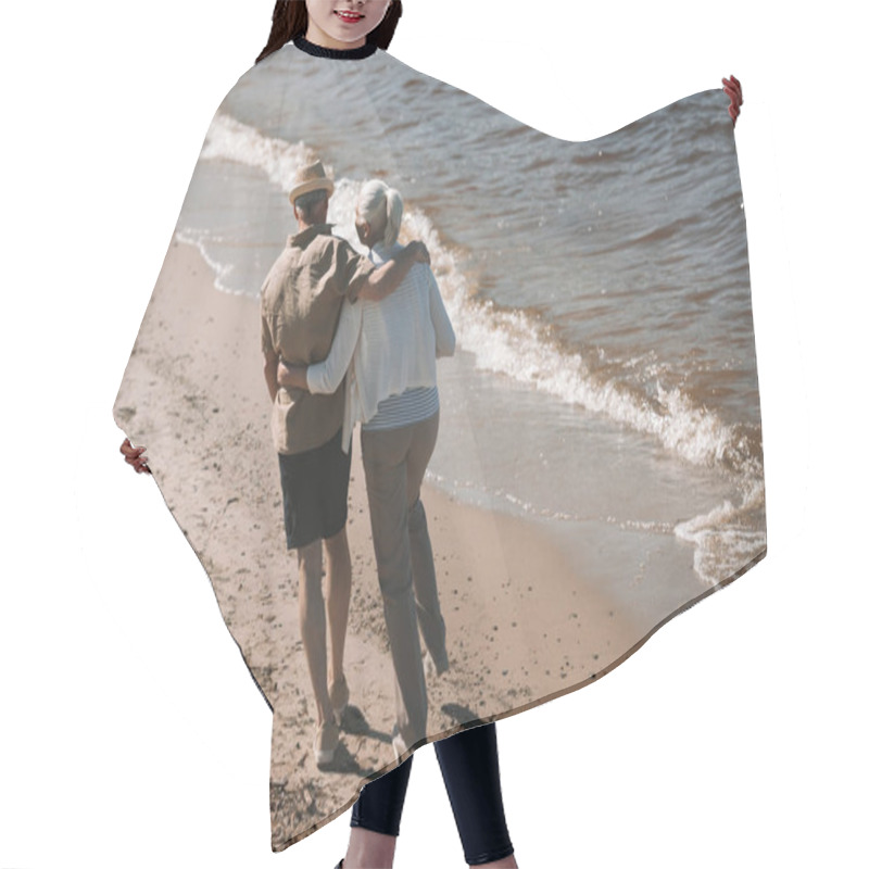 Personality  Senior Couple Walking On Beach  Hair Cutting Cape