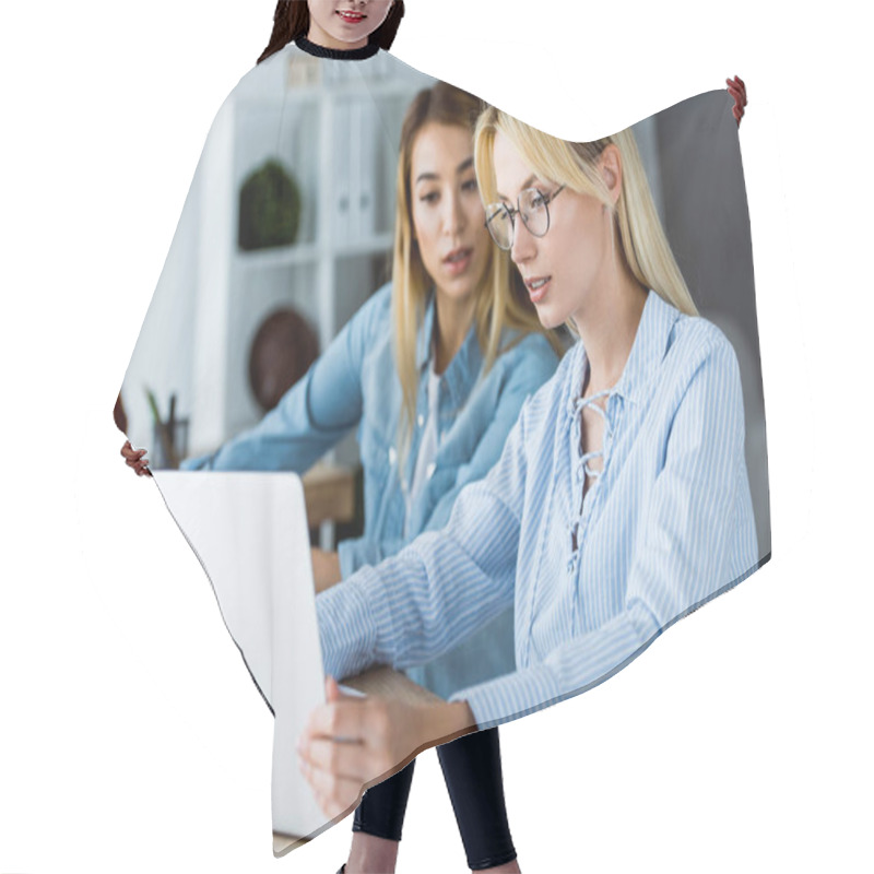 Personality  Multicultural Colleagues Working On Startup Project In Office And Looking At Laptop Hair Cutting Cape