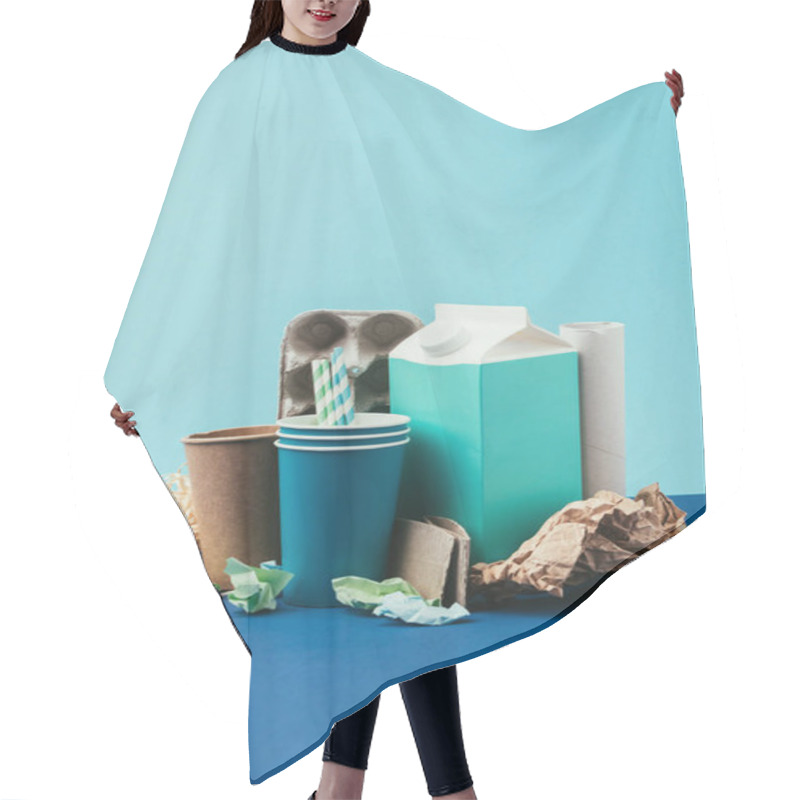 Personality  Close Up View Of Arranged Cardboard And Paper Disposable Garbage On Blue Background Hair Cutting Cape