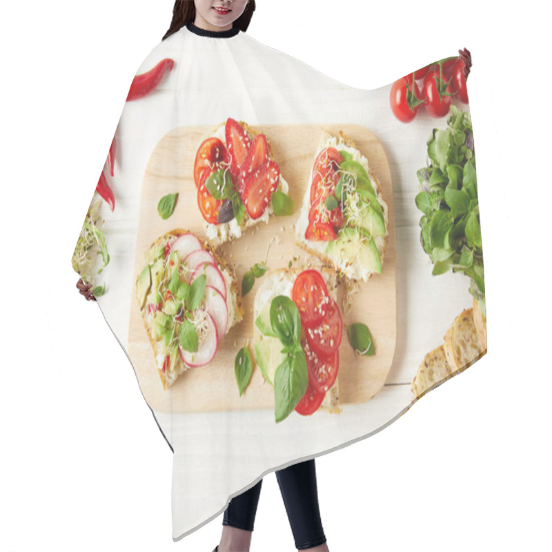 Personality  Top View Of Vegetarian Sandwiches On Cutting Board Surrounded With Ingredients On White Wooden Surface Hair Cutting Cape