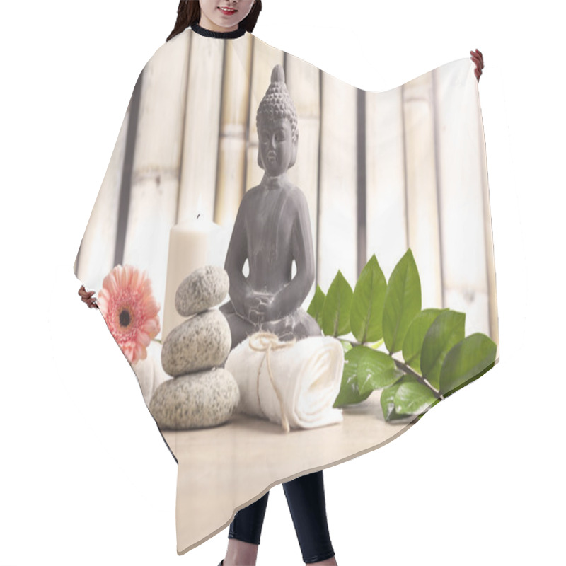 Personality  Wellness And Spa Concept With Buddha Figure Hair Cutting Cape