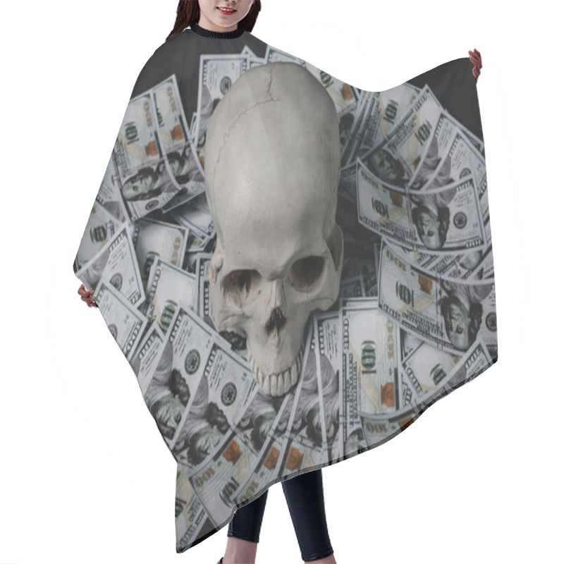 Personality  A Human Skull Lies In The Dark On Money. Hair Cutting Cape