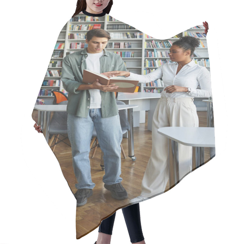 Personality  A Dedicated Teacher Engages Her Student In Learning While Browsing A Book In The Library. Hair Cutting Cape