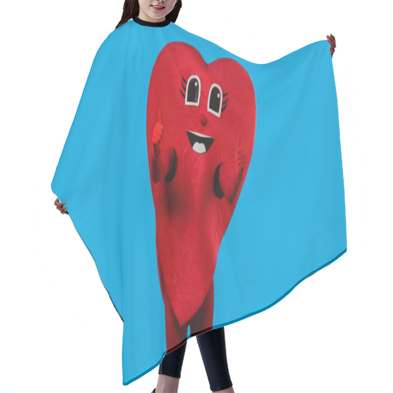 Personality  Person In Pleased Heart Costume Showing Thumbs Up Isolated On Blue  Hair Cutting Cape