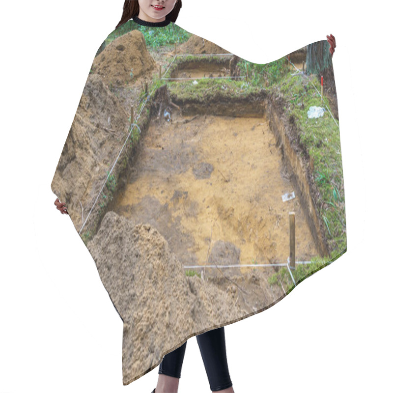 Personality  Archaeological Excavation In A Forest. A Large Plundering Pit Dug By Archaeologist At An Archaeological Site. Legal Historic Excavations. Heritage Concepts. Hair Cutting Cape