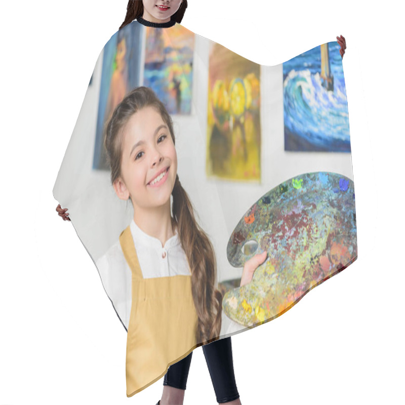 Personality  Smiling Kid Standing With Palette And Painting Brush In Workshop Of Art School Hair Cutting Cape