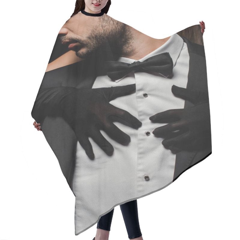 Personality  Young Woman In Gloves Hugging Man In Suit Isolated On Black  Hair Cutting Cape