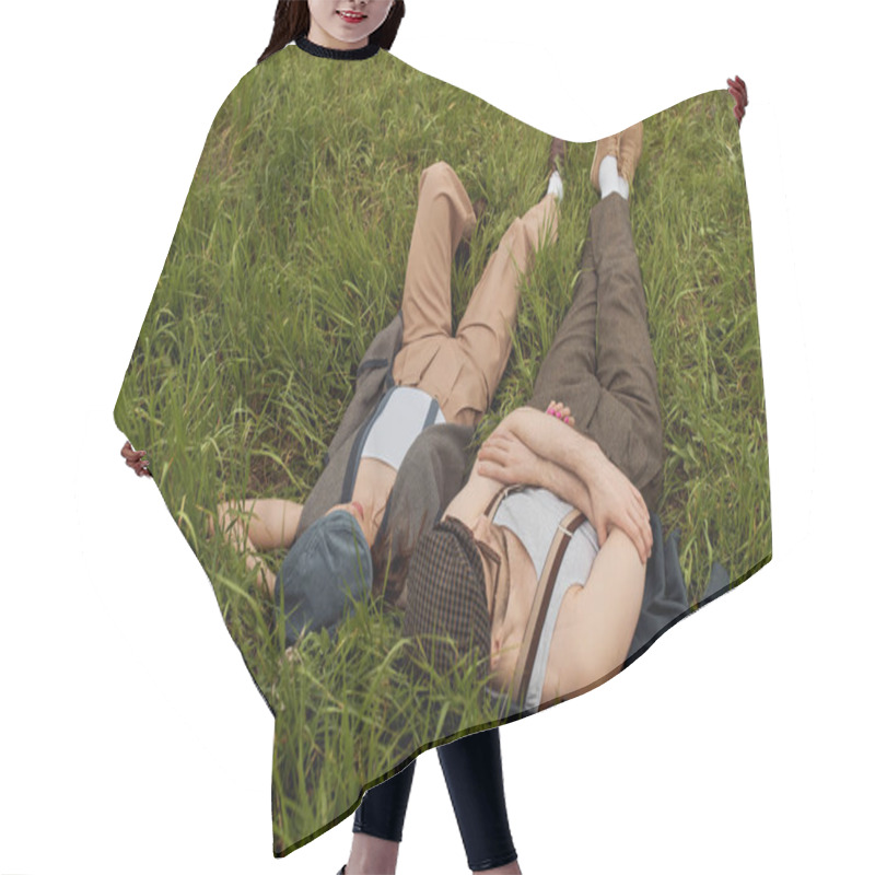 Personality  High Angle View Of Fashionable Romantic Couple In Newsboy Caps And Vintage Outfits Lying, Spending Time And Relaxing Together On Grassy Meadow, Stylish Partners In Rural Escape, Romantic Getaway Hair Cutting Cape