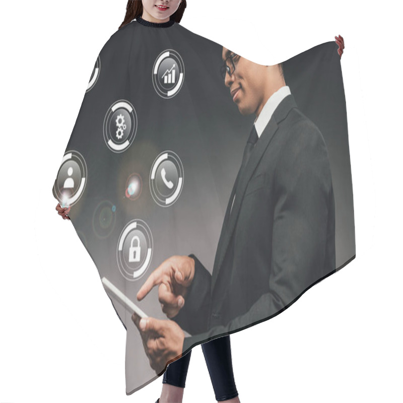 Personality  Side View Of Smiling African American Businessman Using Digital Tablet On Dark Background With Digital Icons Illustration Hair Cutting Cape