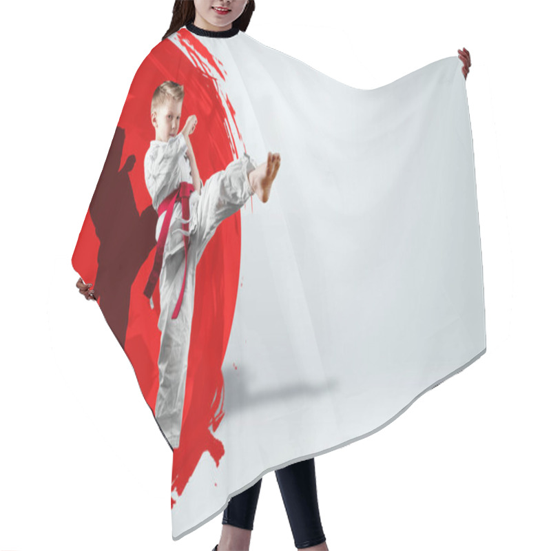 Personality  A Boy In A White Kimono With A Red Belt Against The Background Of A Red Circle, The Sun. Karate Concept, Goal, Training, Achievement Hair Cutting Cape